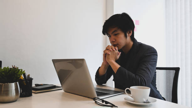 istock Businessman analyzing financial data on laptop computer at office. 1331029819