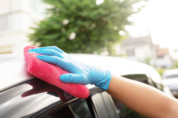 istock Car care workers cleaning the car 1331030468