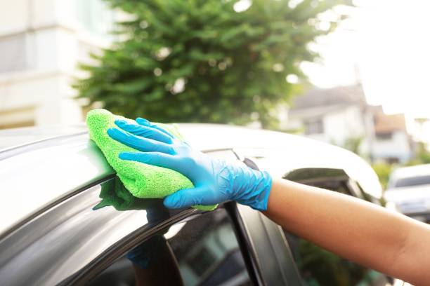 istock Car care workers cleaning the car 1331030590