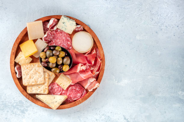 istock Charcuterie and cheese plate, overhead shot with a place for text 1331034714