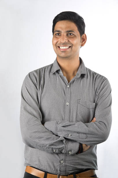 istock Happy man with arms crossed over white background 1331037299