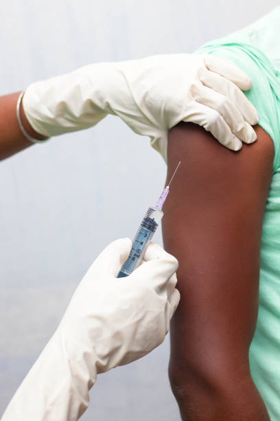 istock a man is vaccinated by a doctor. 1331040433