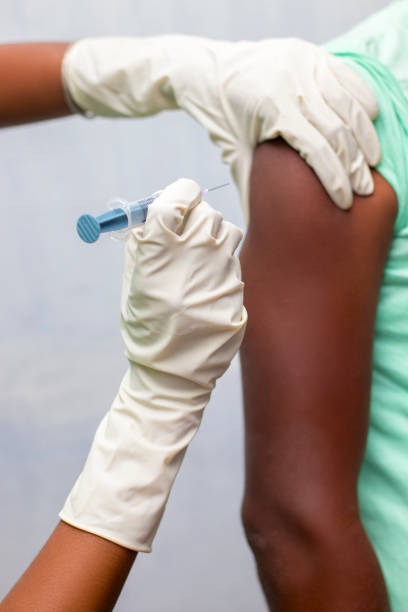 istock a man is vaccinated by a doctor. 1331040454