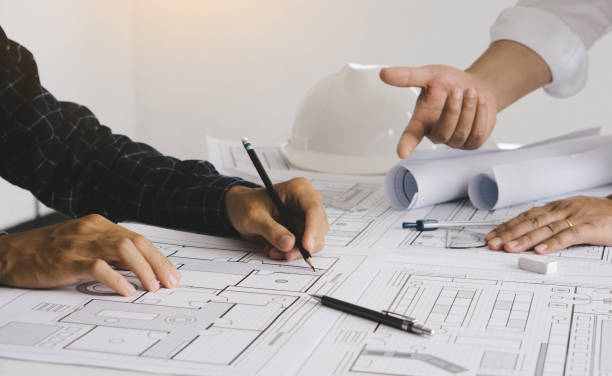 istock engineer and partner meeting for architectural project.Construction concept. 1331041338
