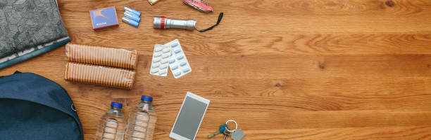 istock Top view of emergency backpack preparations 1331048890