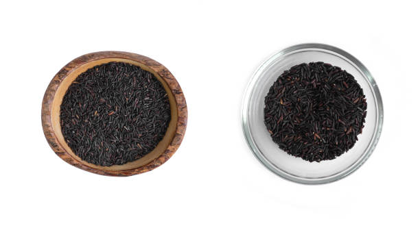 istock Paddy rice with black riceberry rice isolated on white background. Organic. Raw, wheat or grain. Agriculture. Food. 1331051139