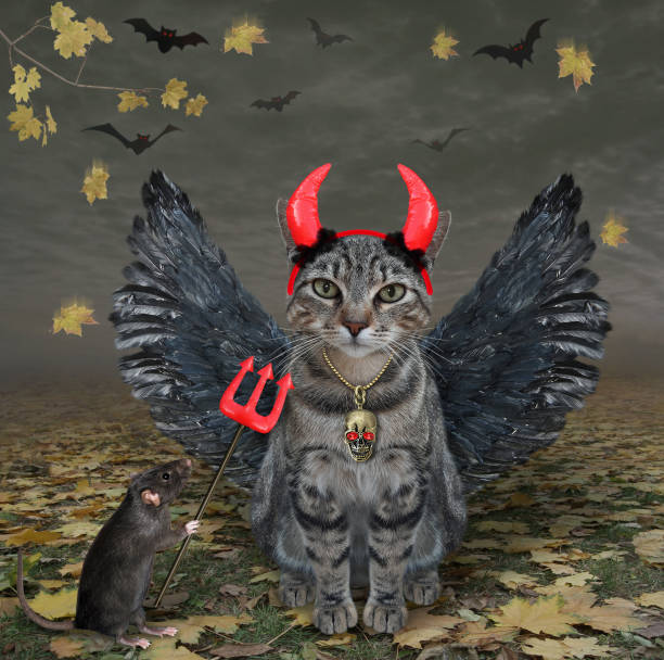 istock Cat gray horned with bird wings in forest 1331052165