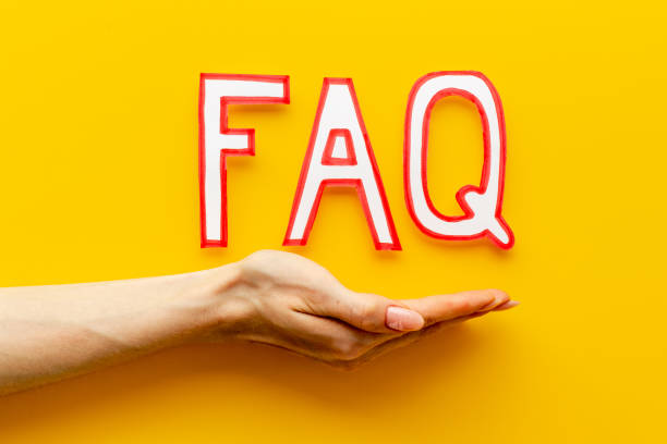 istock Hands with faq - frequently asked questions - paper letters, top view 1331056749