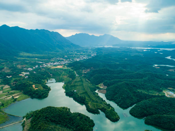 istock Village and lake under the mountain 1331057373