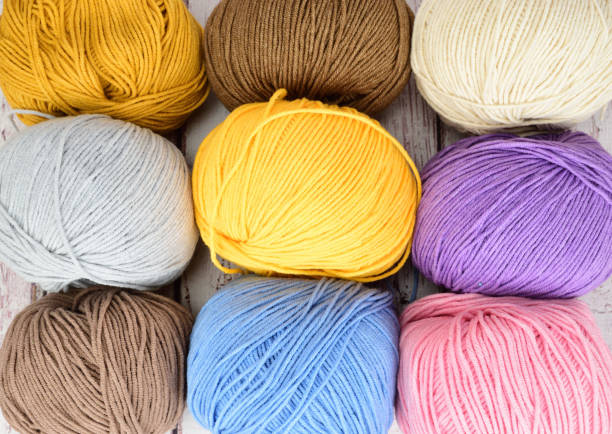 istock multicolored balls of wool for crocheting, lying on the side in three rows 1331058121