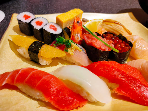 istock Close-up rice ball sushi in restaurant. 1331058223