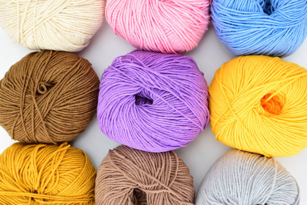 istock Multi-colored skeins of crochet wool laid out in several rows 1331058537