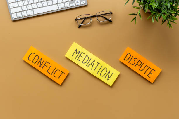 istock Conflict resolved concept. Mediation word on sticky notes on office table 1331058591