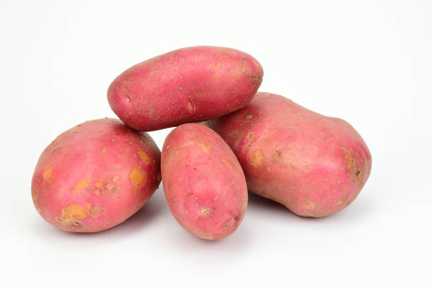 istock Small pile of red potatoes isolated on white background. 1331058743