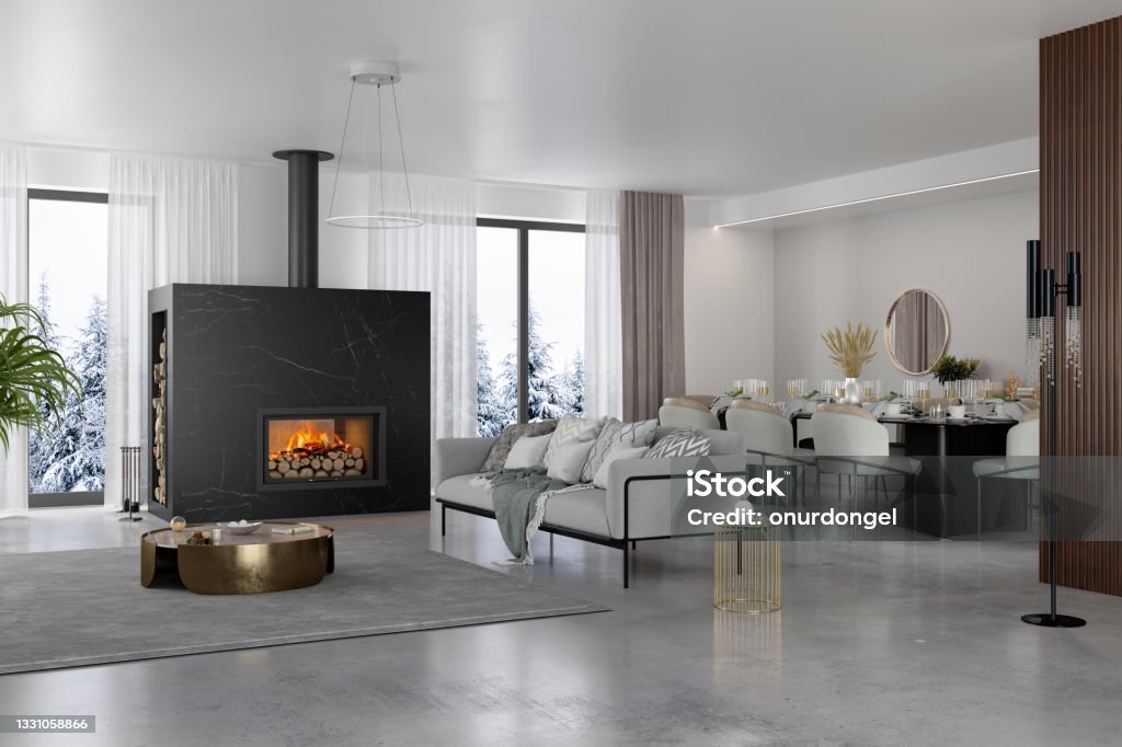Luxury Living Room Interior With Fireplace, Dining Table And Snow View From The Window Luxury Stock Photo
