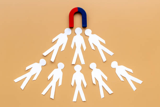 istock Horseshoe magnet attractives human figures. Increase team and recruiting concept 1331061417