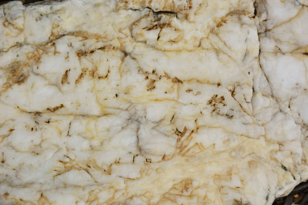 istock Natural light stone with orange veins, texture close-up 1331062807