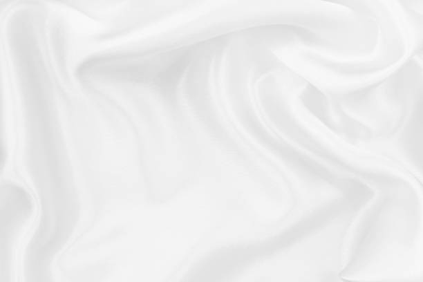 istock White fabric cloth texture for background and design art work, beautiful crumpled pattern of silk or linen. 1331065834