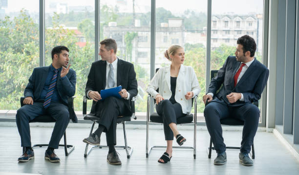 istock group of business people exchanging idea while having workshop training at seminar hall, Business speaker advising business planning, Business workshop training event. Business workshop training concepts. 1331069279