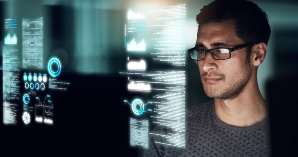 istock Shot of a man working on a computer in an office at night 1331074218