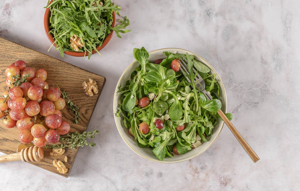 istock Delicious salad made from caramelized roasted grapes, peppery arugula, toasted walnuts, and pecorino cheese. 1331075285