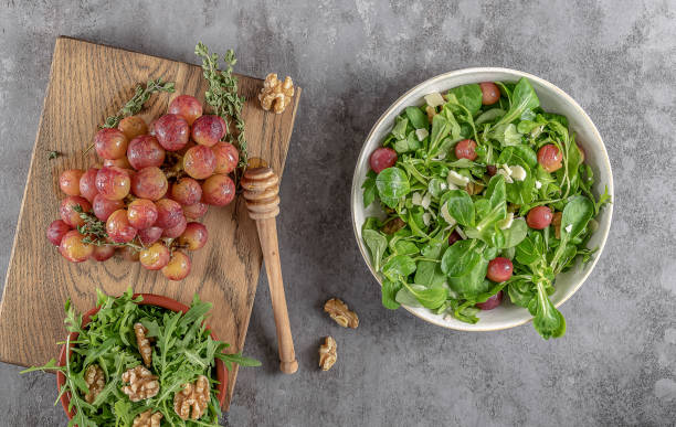 istock Roasted grapes, pecorino, walnut, and arugula salad. 1331075414