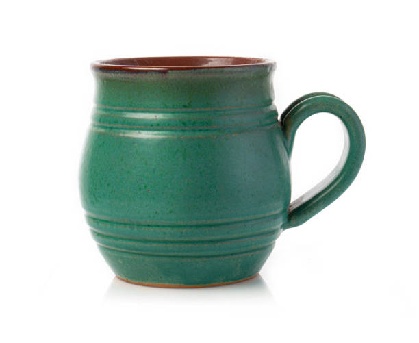 istock Green jug. Isolated on white background. 1331075640