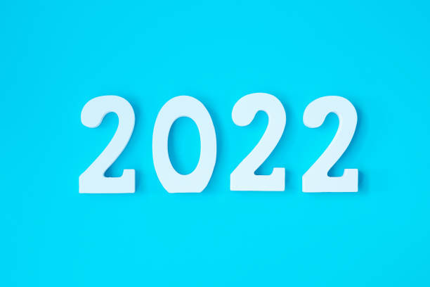 istock 2022 white text number on blue background. Resolution, plan, review, goal, start and New Year holiday concepts 1331075890