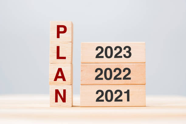 istock PLAN text with 2023, 2022 and 2021 wooden building blocks on table background. Risk Management, Resolution, strategy, solution, goal, New Year New You and happy holiday concepts 1331076762