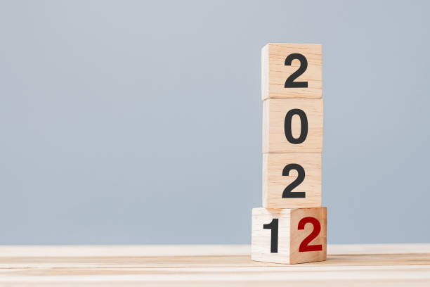 istock 2022 wooden cube blocks on table background. Resolution, plan, review, goal, start and New Year holiday concepts 1331076965