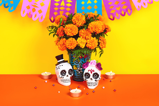 Day of the dead, Dia De Los Muertos Celebration Background With sugar Skull, calaverita, marigolds or cempasuchil flowers and candles with Copy Space. Traditional Mexican culture