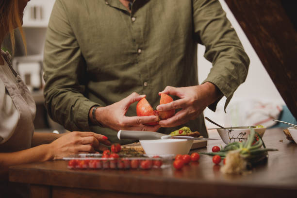 istock Opening the pomegranate in half as a perfect addition to delicious dinner 1331081440
