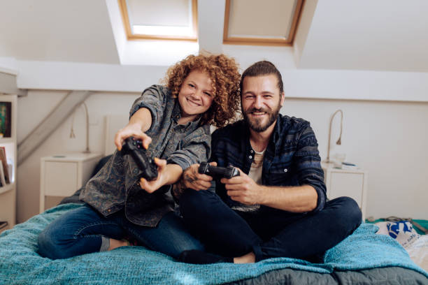 istock Young couple playing a video game and having fun 1331081499