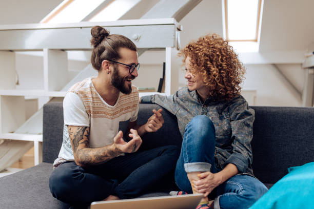 istock Young couple watching something online and having fun 1331081514