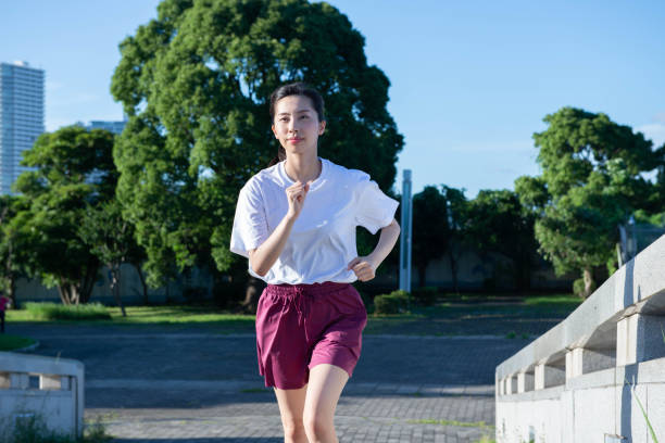 istock young woman jogging 1331089377