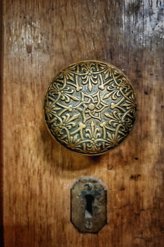 Closeup of antique doorknob with keyhole
