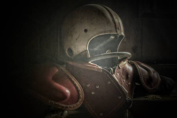 Football Gear Football gear in a very dark and forgotten house old football stock pictures, royalty-free photos & images