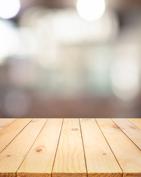 istock Wood texture table top (counter bar) with blur light abstract bokeh in cafe,restaurant background 1331090877