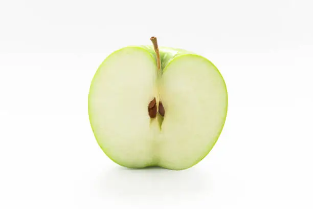 Green apple on white background in Valencia, Valencian Community, Spain