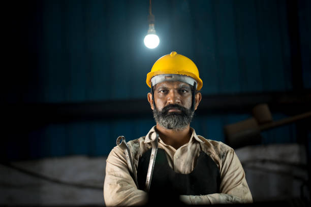 istock Industrial worker holding wrench 1331097230
