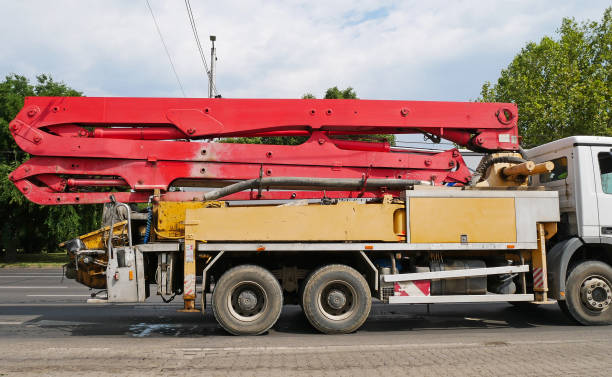 istock Concrete pump truck on the road 1331097422