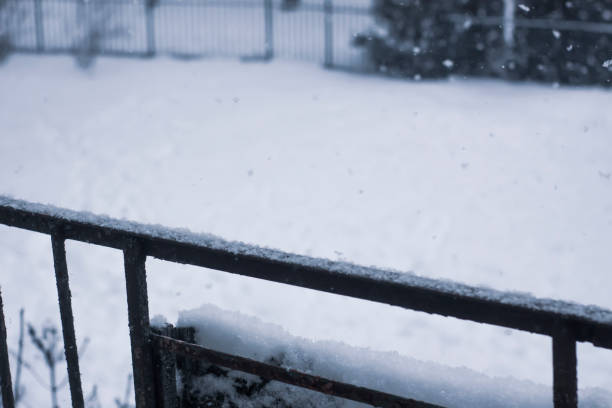 istock Fresh snow on the metal balcony railing 1331097738