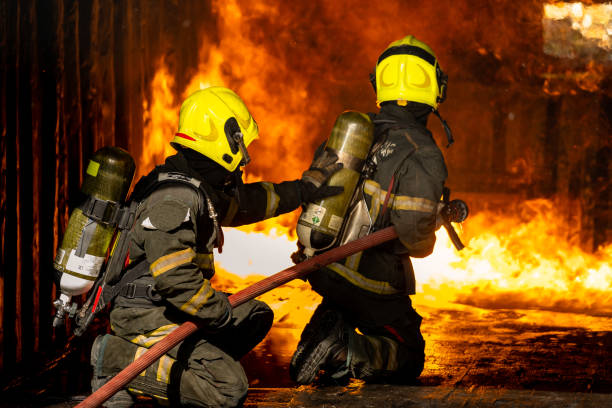 istock Firefighters are conducting fire drills by spraying water to extinguish the raging fire. 1331100535