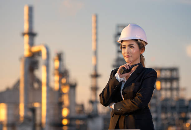 istock Engineer inspecting in industrial oil refinery. Industry 4.0 concept. Background blurred concept. 1331100545