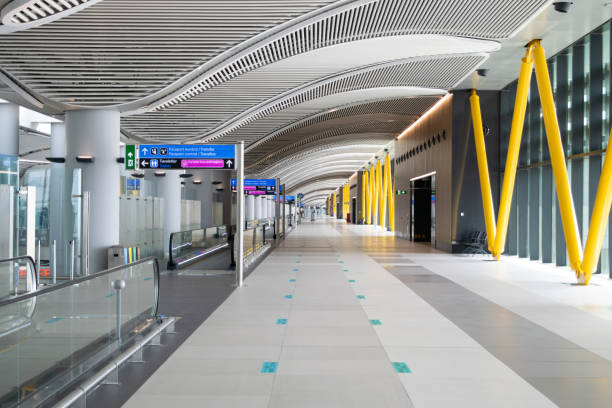 Moving Walkways in Modern Airport Terminal stock photo