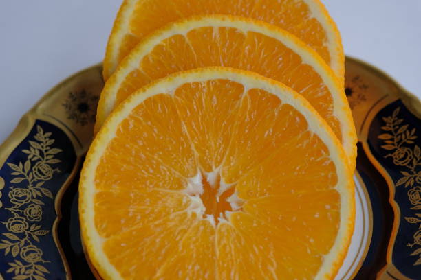 istock ripe and juicy orange. sliced fresh orange 1331108593
