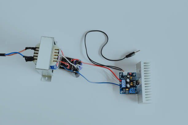 istock Diy mini power amplifier board with power supply on background. 1331108709