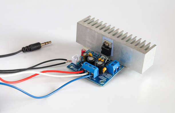 istock Diy mini power amplifier board with power supply on background. 1331108712