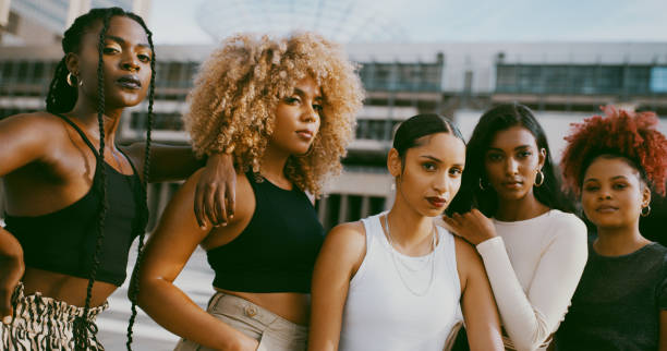 Shot of a diverse group of women posing in the city together during the day Oh, we see you looking natural hair stock pictures, royalty-free photos & images