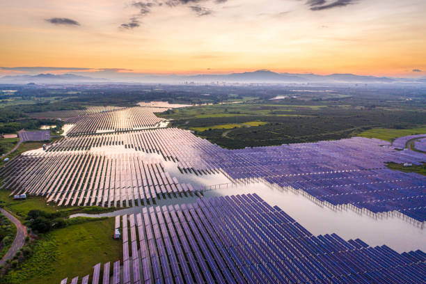 istock Huge solar farm with sunset view 1331118431